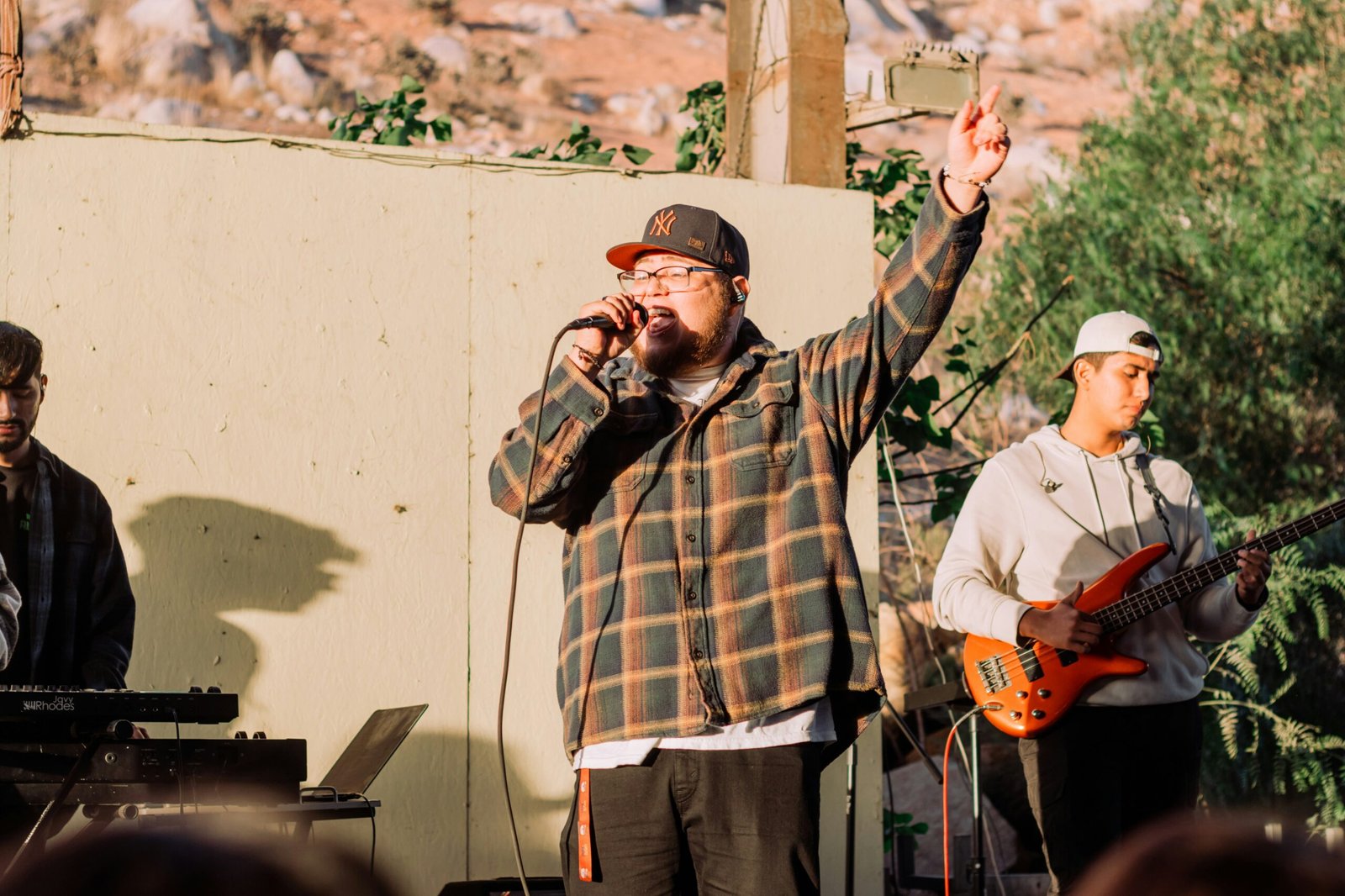 a man singing into a microphone